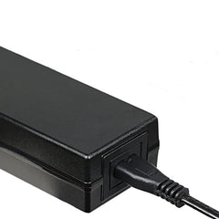 Jucuwe 42V 2A adapter side view, compact design fits bike compartments.