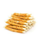 Jungle Calling chicken wrapped rawhide sticks shown as a dental friendly chew for dogs