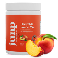 JUNP orchard fresh peach flavor glass showing fruity hydration for workouts.