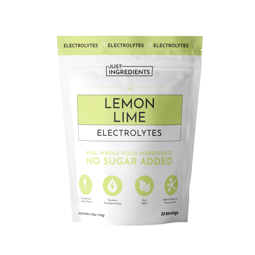 Just Ingredients Lemon Lime Electrolytes bottle-pour shows refreshing hydration for active days.