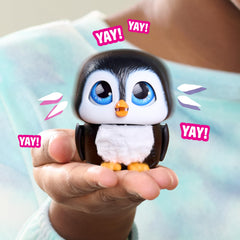 FurReal Handfuls Shivers penguin sparkly blue eyes enhance captivating playtime.