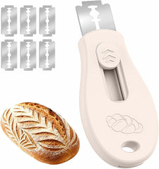 KacNacPro Bread Lame with magnetic closure demonstrates secure scoring on dough.