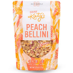 Katys Peach Bellini loose tea pouch showing real fruit pieces and bright color