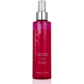 Kenra Platinum Color Charge Spray Serum bottle on vanity for color protection and shine.