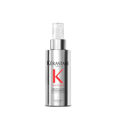 KÉRASTASE Premiere serum bottle close-up shows frizz control and heat protection