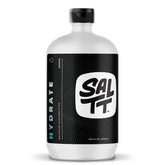 Keto Chow SALTT Hydrate bottle being poured for refreshing electrolyte drink