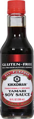 Kikkoman Gluten Free Tamari label closeup highlighting non-GMO soybeans
