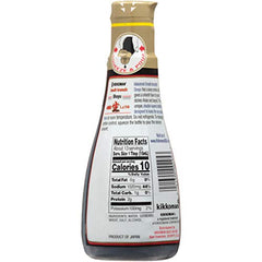 Kikkoman Smooth Aromatic soy sauce color close-up showing bright reddish amber hue
