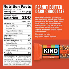 KIND bar close-up showing peanuts and almonds with dark chocolate for protein.