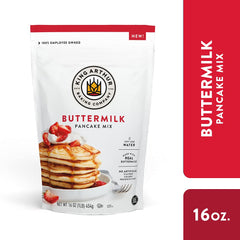 Stack of fluffy pancakes with syrup made from King Arthur mix