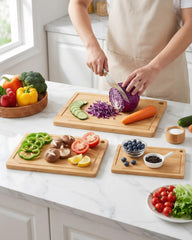 Kitsure boards feature juice groove to catch liquids during prep.