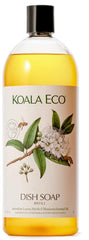Koala Eco dish soap foaming on sponge with lemon myrtle scent for clean, bright results.