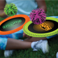 Koosh Paddle Playset demonstrates bounce-surface action for two-player games.