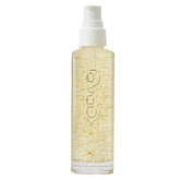 Kopari Golden Aura Oil bottle close-up highlighting radiant glow.