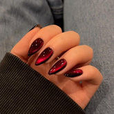 KQueenest dark red cat eye nails show elegant burgundy shimmer for evening looks