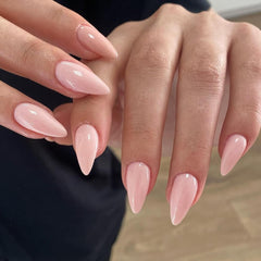 KQueenest dusty pink almond nails on display with a durable, glossy finish.
