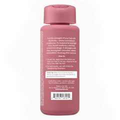 Kristin Ess Biotin Deep Conditioner label close-up showing vegan formula