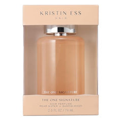 Spray nozzle in action refreshing dry hair with a light, non-greasy mist.