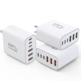 Kruidvat 3-pack 65W GaN charger front view powering multiple devices efficiently.