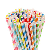 KTOJOY rainbow-striped paper straws in a colorful drink setup, eco-friendly option