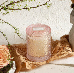 LA JOLIE MUSE Santal Rose candle with sandalwood base creates serene, grounding mood.