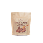 La Nogalera honey glazed pecans in a 5oz pouch for on-the-go snacking.