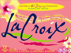 La Croix Hi-Biscus twelve-pack box displayed in the refrigerator for quick flavor options.