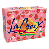 La Croix Strawberry Peach bottle with bubbles, showcasing natural flavor for a refreshing sip.
