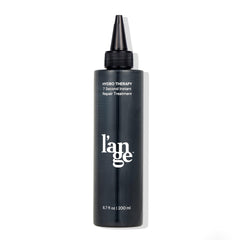 L'ANGE HAIR Hydro Therapy bottle pour demonstrates fast 7-second repair for smoother, shinier hair