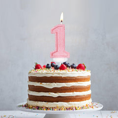 LASILE pink first birthday candle adding a cute focal point