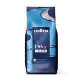 Lavazza Dek Filtro whole bean bag on kitchen counter for drip coffee convenience.