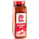 Lawry's Seasoned Salt bottle pouring to add bold flavor during meals.