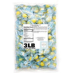 Lemonheads hard candy close-up shows bright yellow tangy shell.