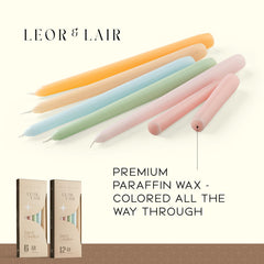 Leor & Lair pastel taper candle in pink enhances baby shower table decor.