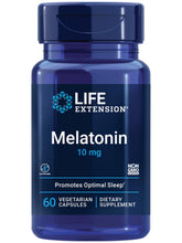 Life Extension Melatonin 10 mg bottle on nightstand for restful sleep support.