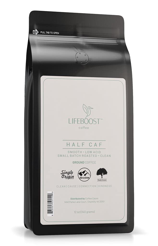 LIFEBOOST Half Caff ground coffee cup foreground delivering smooth morning energy.
