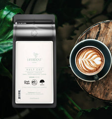 LIFEBOOST Half Caff ground coffee packaging displays organic, non-GMO quality.