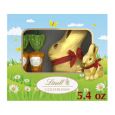 Lindt Gold Bunny Milk Chocolate shines in gold foil, perfect Easter gift centerpiece.