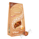 Lindt LINDOR Carrot Cake bag front with festive packaging for sharing