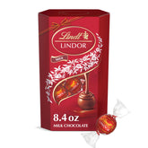 Lindt LINDOR Milk Chocolate Truffles gift box front, elegant presentation for celebrations.