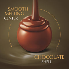 Lindt LINDOR milk chocolate truffles closeup, creamy melting center.