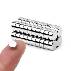 Linlinzz 40pcs magnets pack on fridge holding notes securely.