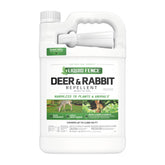Liquid Fence deer and rabbit repellent bottle ready to protect plants.