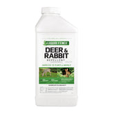 Liquid Fence deer and rabbit repellent concentrate bottle protects a flower bed