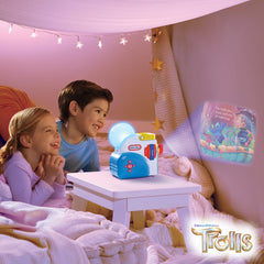 Little Tikes Story Dream Machine Trolls stories projected on wall with vivid colors.