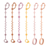 LittleHugs toy straps on a stroller keep belongings secure.