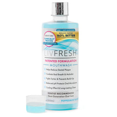 LIVFRESH mouthwash bottle being poured for a fresh breath boost.