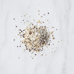 Livia’s Salt Pepper Garlic Seasoning shaker on hand for quick, even everyday seasoning