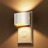 L LOHAS LED night light plugged into wall outlet for safe hallway lighting.