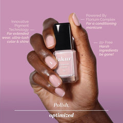 LONDONTOWN Lakur applying with brush stroke across a nail swatch